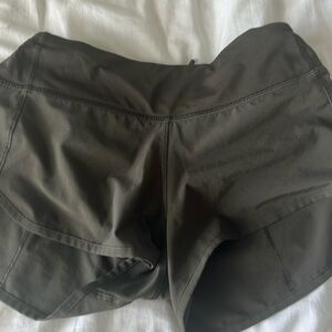 Army green lululemon shorts size 0 with a tuck on the sides